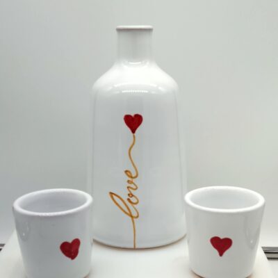 Oliera bottiglia con bicchiere